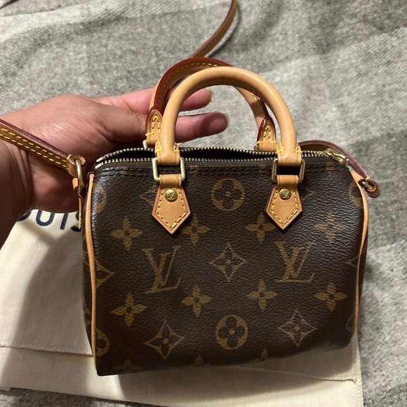 Louis Vuitton Mini Brown Monogram Bag

Speedy Nano! - Picture 9 of 10